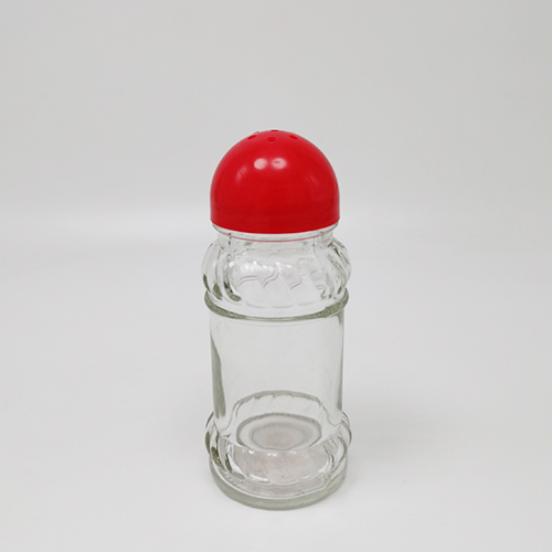 Cylindrical pattern glass bottle with oval red plastic lid for black pepper powder
